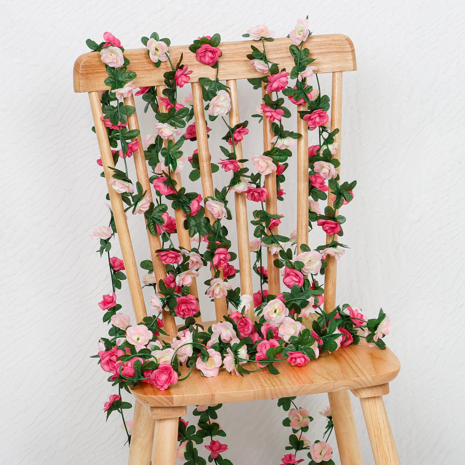KHOYIME rose vine drapes over tables and fences for ambiance.