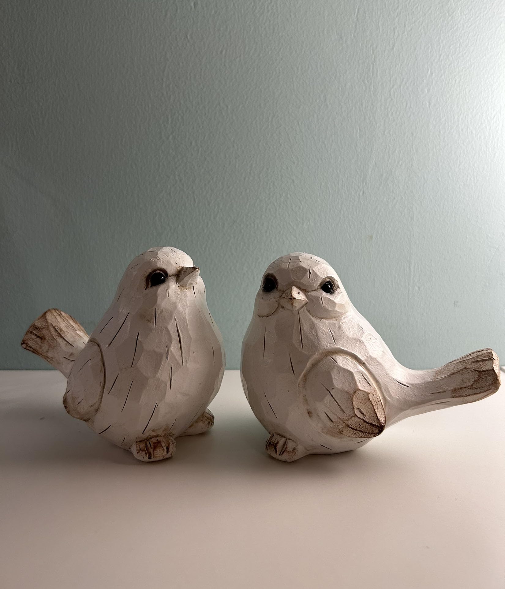 KiaoTime resin bird statue decor complements living rooms and mantels