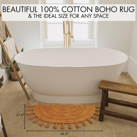 KIBAGA beige half-circle rug fits neatly in front of a vanity.