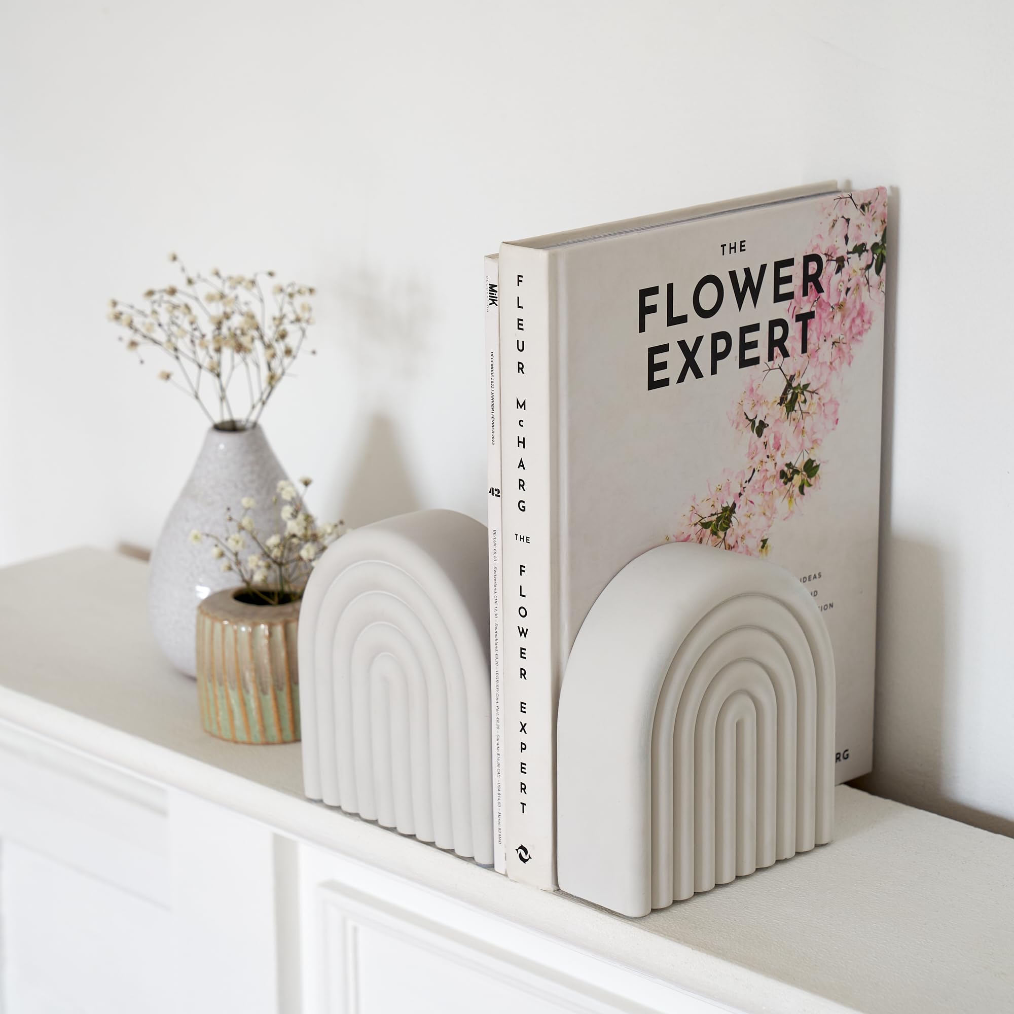 KIBAGA concrete bookend featuring rainbow arch adds bold minimalist style to shelves.