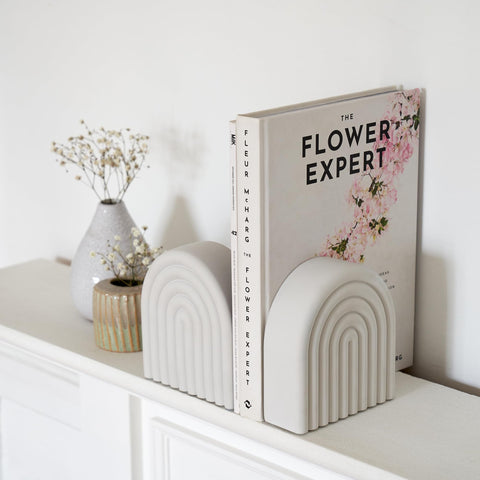 KIBAGA concrete bookend featuring rainbow arch adds bold minimalist style to shelves.
