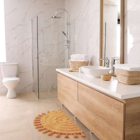 KIBAGA half-circle rug in boho style provides soft cotton comfort by the sink.