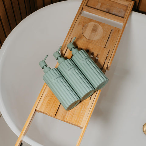 KIBAGA dispenser trio displayed as elegant bathroom decor