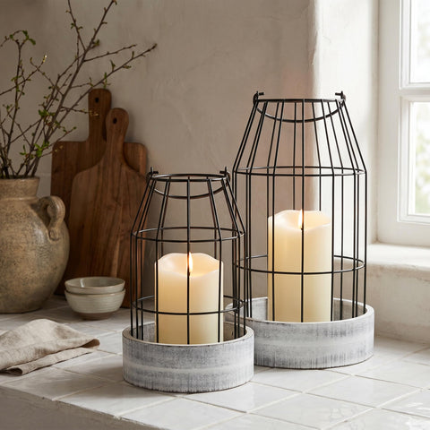 KIBAGA large lantern on fireplace mantle adds rustic focal point.