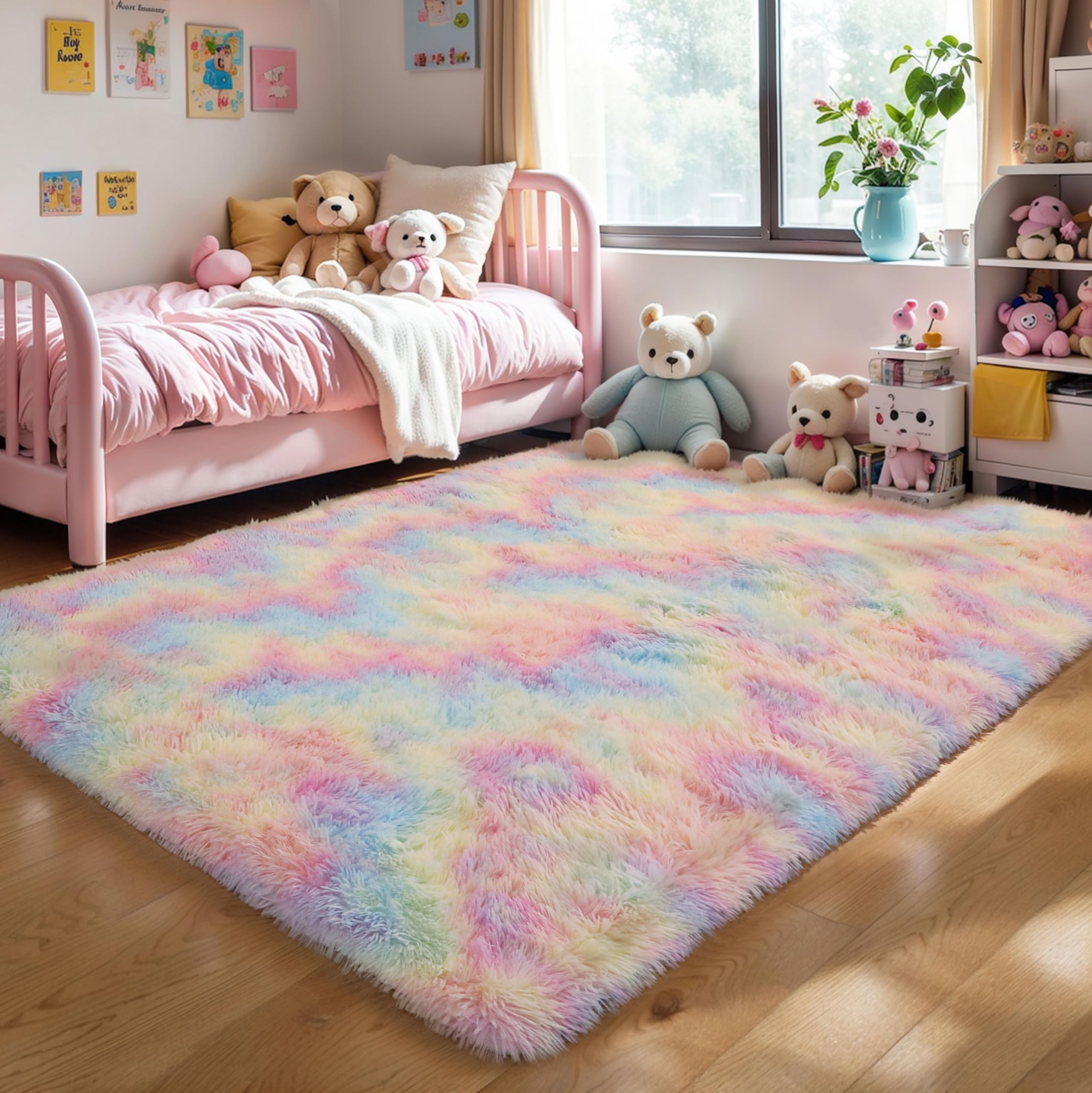 KICHOWUA rainbow rug features pastel colors that coordinate with kids' decor.