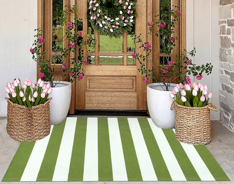 KIhipIoe striped cotton outdoor rug in green and white, durable for porches and patios.