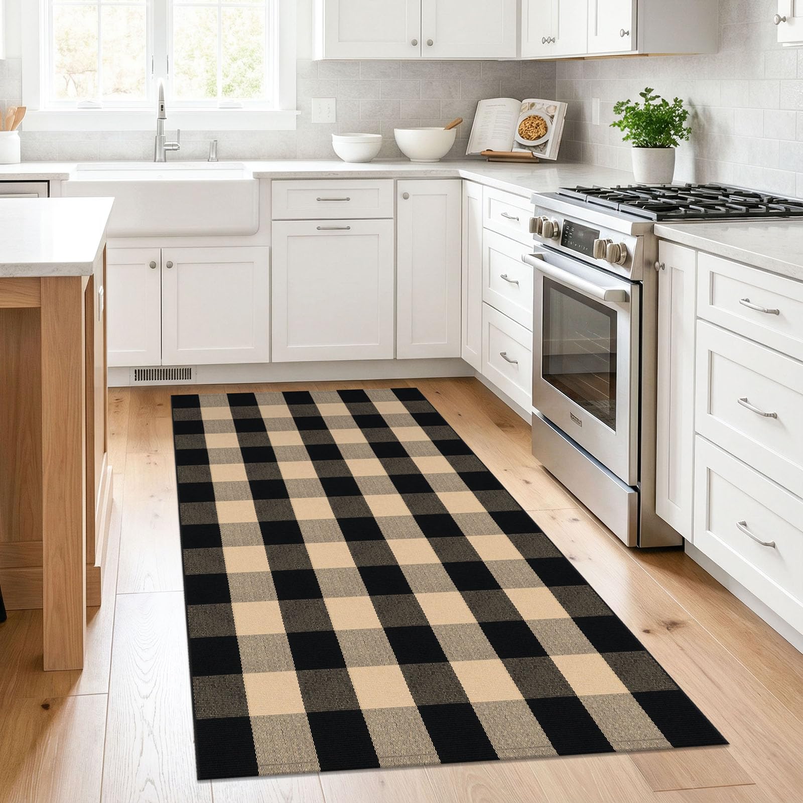 Brown and black tones of KILOCOCO rug create versatile layered look.