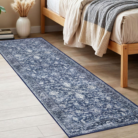 KILOCOCO distressed blue rug adds depth and charm to hallways.