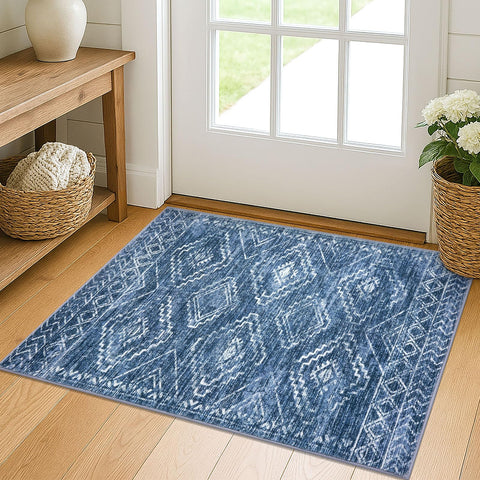 KILOCOCO entryway rug 2x3 with blue geometric design catches dirt at door.