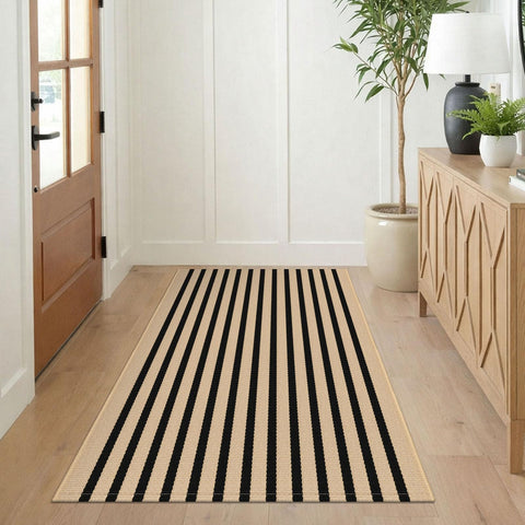 KILOCOCO woven cotton-blend rug detail highlighting stain resistance for outdoor and indoor use.