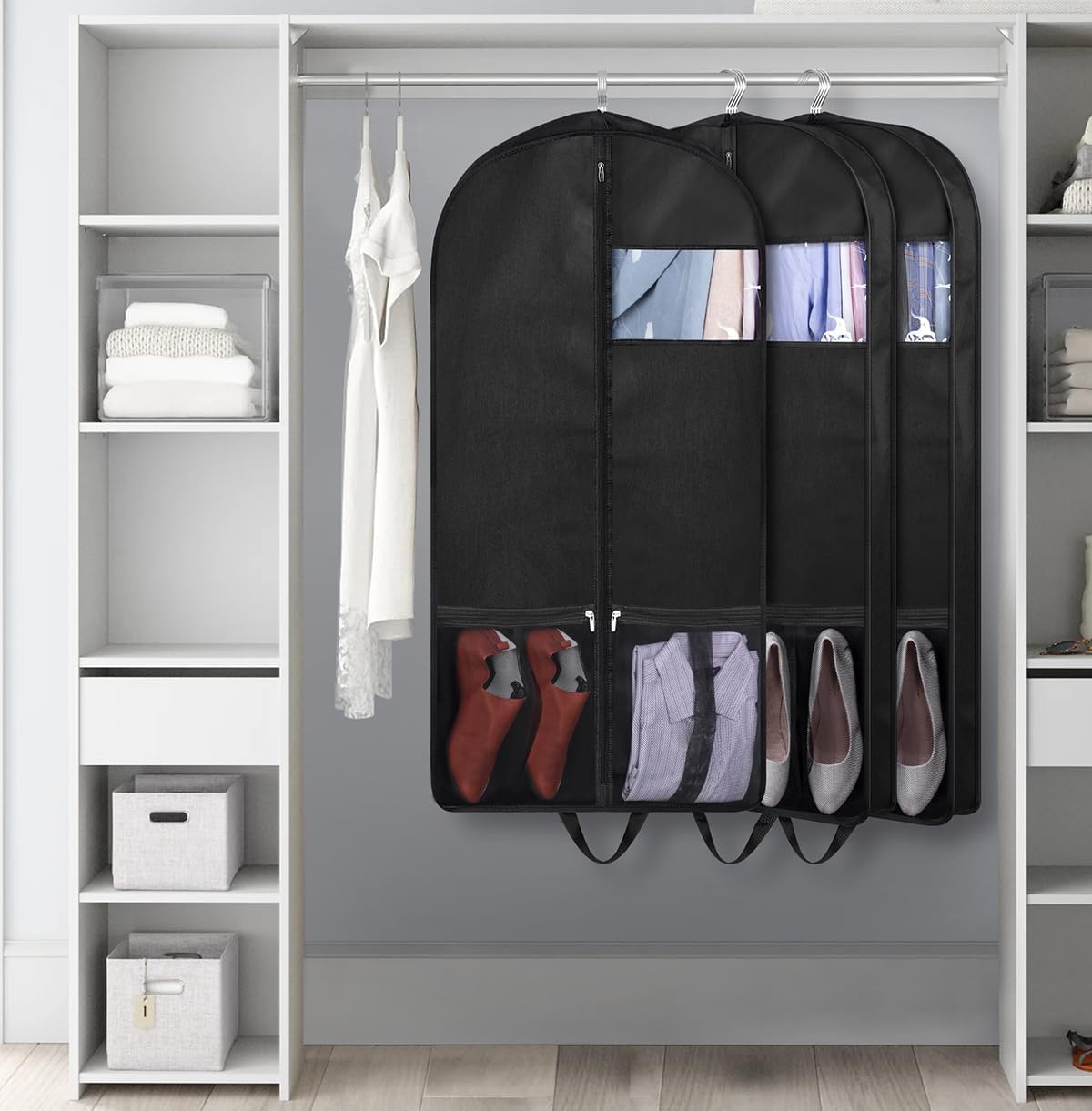 KIMBORA black finish garment bag blends with wardrobe and shelves for tidy storage.