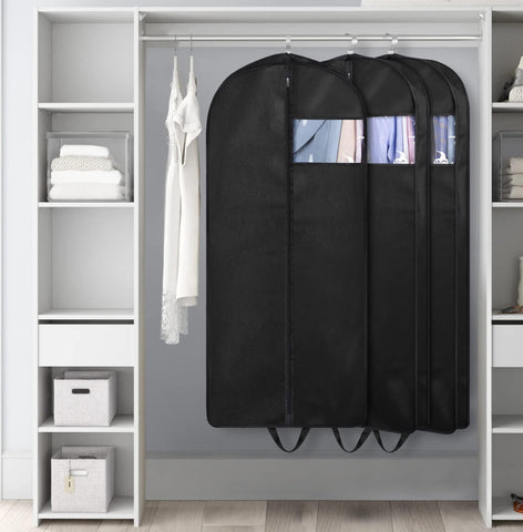 KIMBORA organized wardrobe with color coordination using suit bags.