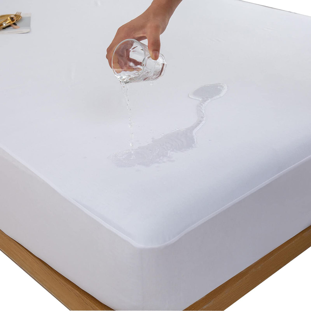 Kingnex waterproof mattress protector close-up showing the TPU barrier.