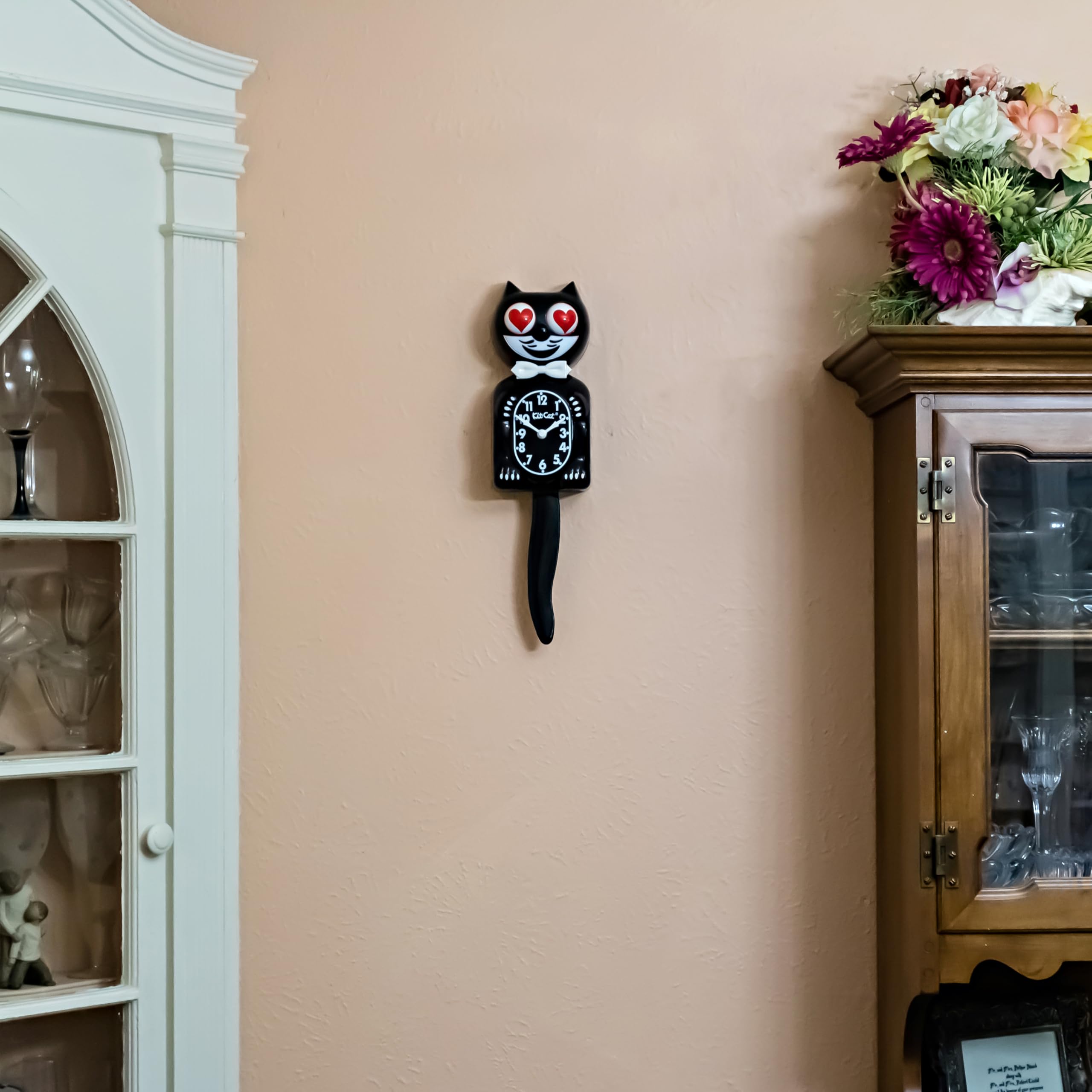 Kit Cat Klock classic black tail movement adds whimsical motion in rooms.