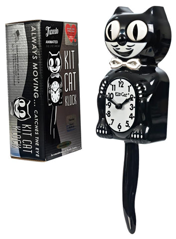 Kit-Cat Klock eyes in motion highlight iconic movement.