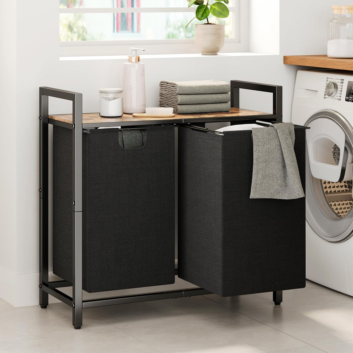 Kitstorack laundry basket organizer front view with divided compartments for sorting.