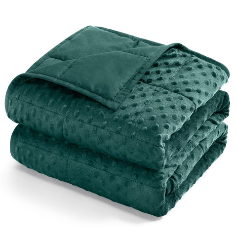 Kivik cooling weighted blanket on bed showing full-coverage fit for queen size.