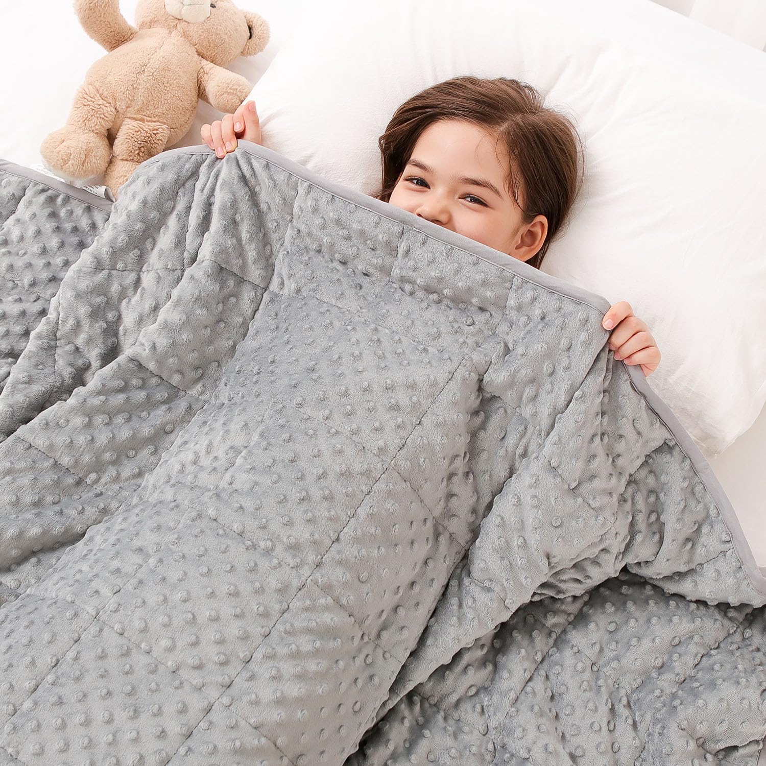 Kivik weighted blanket dots closeup showing soft minky texture for soothing comfort
