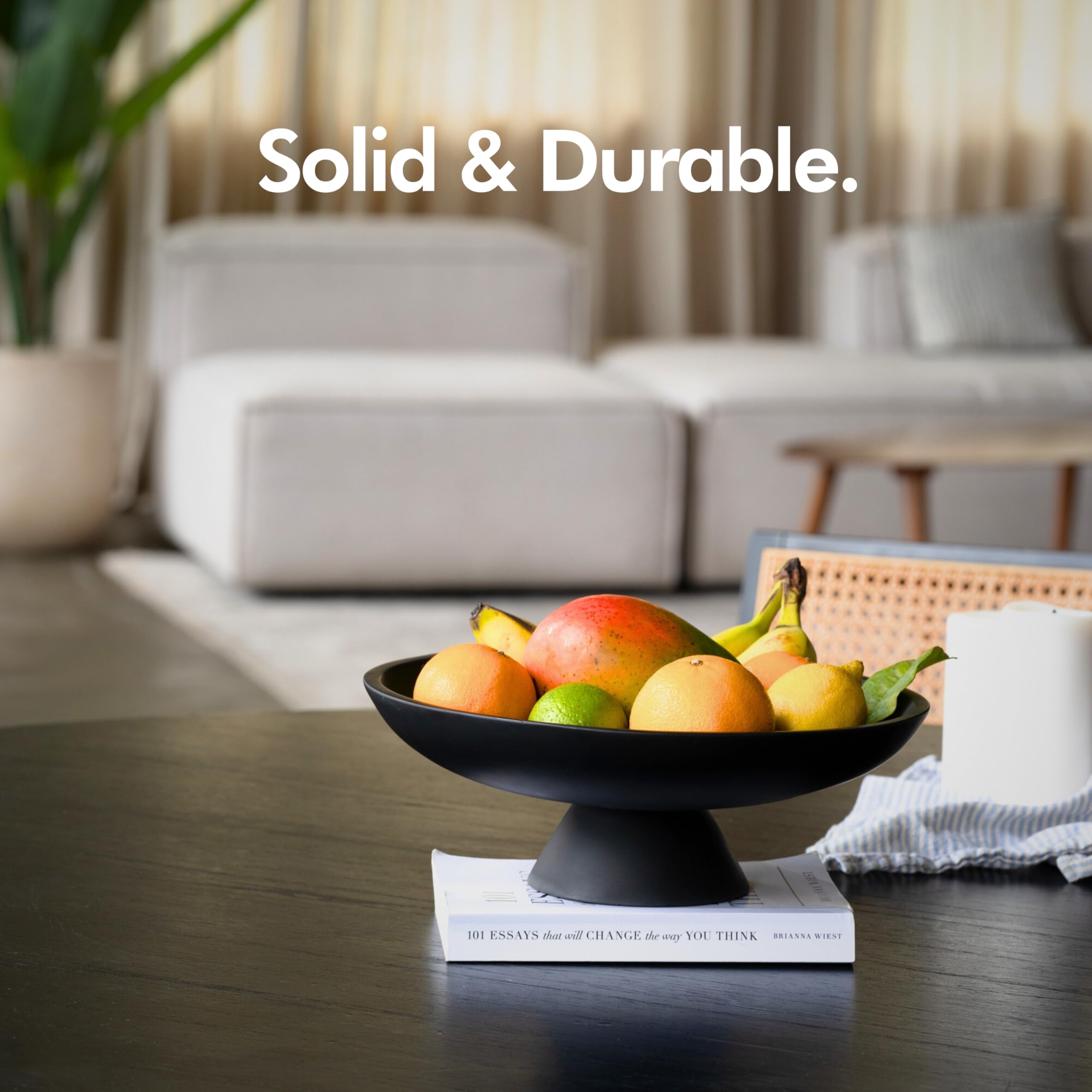 KIVY concrete fruit bowl modern home dining setup, complements contemporary interiors.