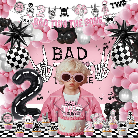 Klarvyius Bad Two the Bone cupcake toppers coordinate with the banner.