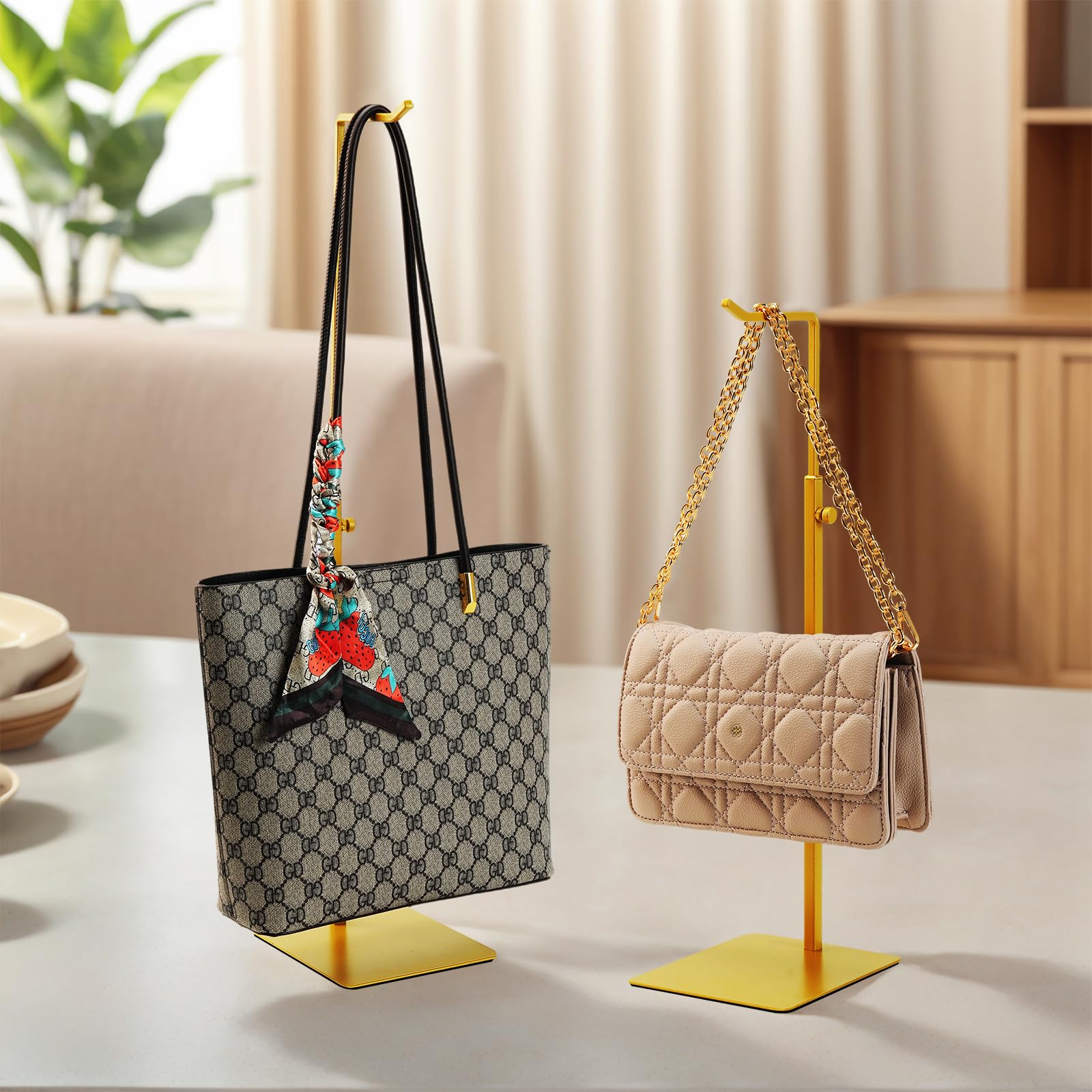 KMtilsh golden handbag display with metal base provides sturdy support