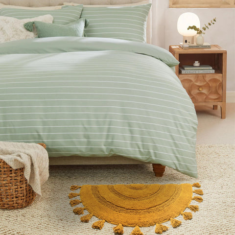 KOEXM nursery-friendly rug adds soft comfort to little feet.