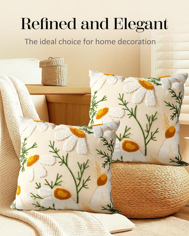 Kokaaee 3D embroidery adds tactile detail to decorative cushions.
