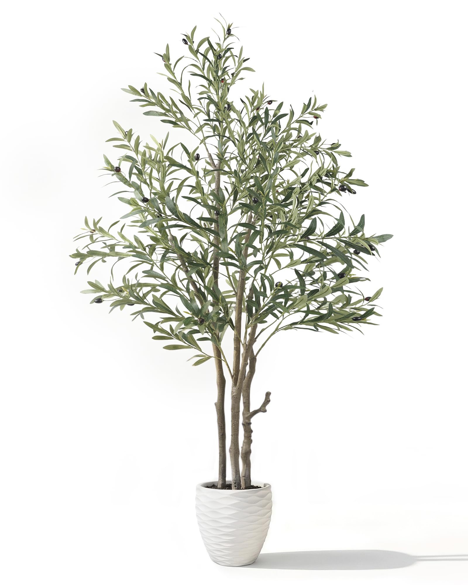KOL 6ft artificial olive tree indoors elevates living room greenery.