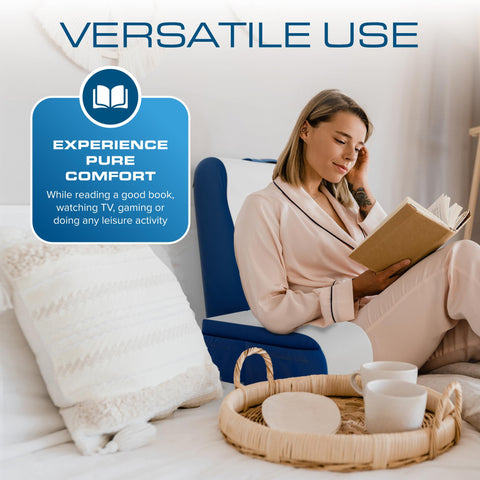 Kölbs wedge pillow with arm rests and pockets keeps remotes within reach.