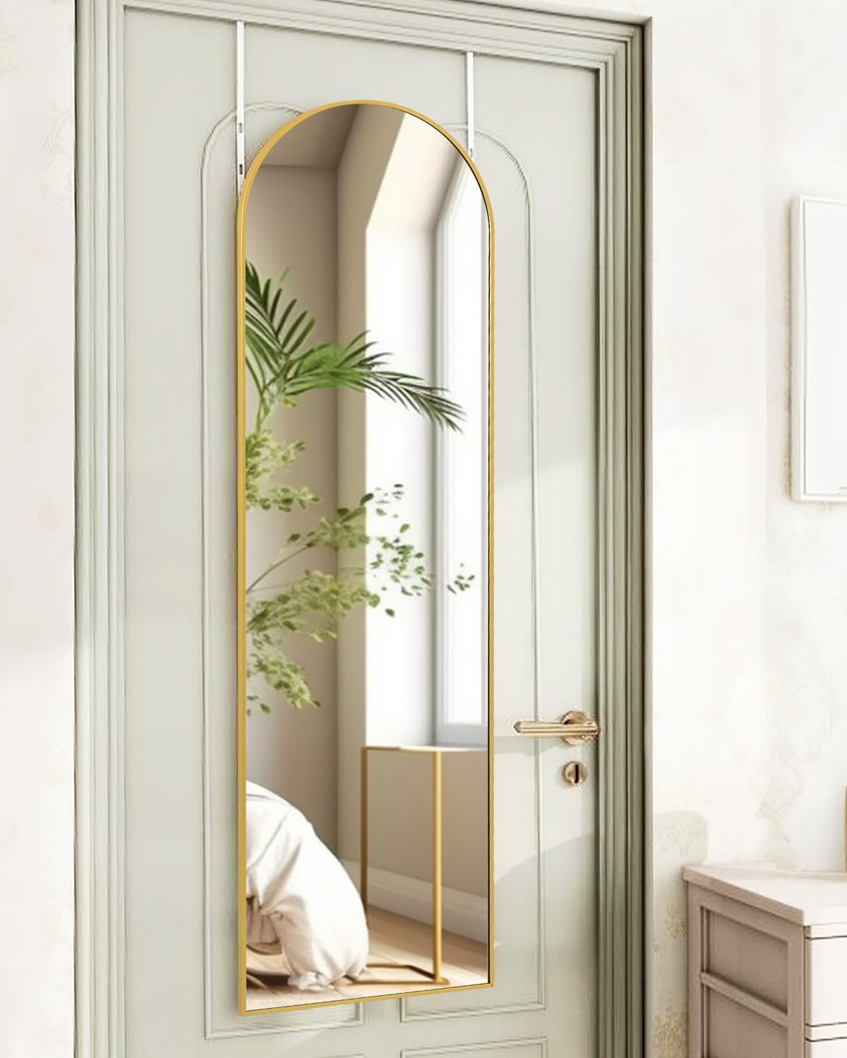 KOMCOTE full-length arch-top mirror provides a complete body view for dressing routines