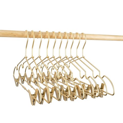 Koobay kid-friendly gold metal hanger suitable for children's clothing.