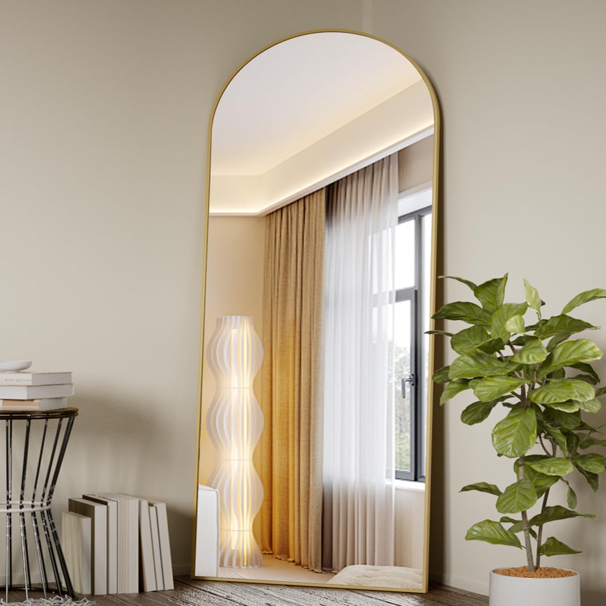 Koonmi arched full-length mirror 71x26 provides a full-body view in a stylish floor design.