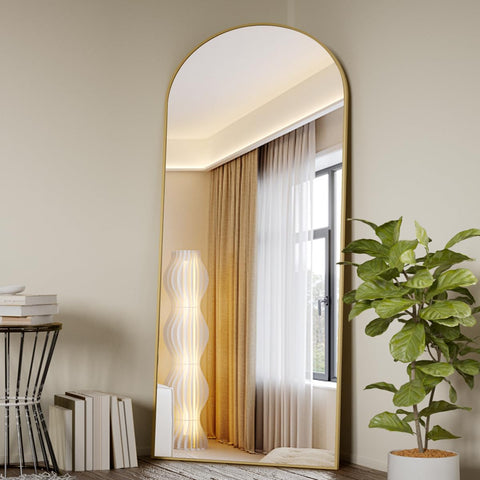 Koonmi arched full-length mirror 71x26 provides a full-body view in a stylish floor design.
