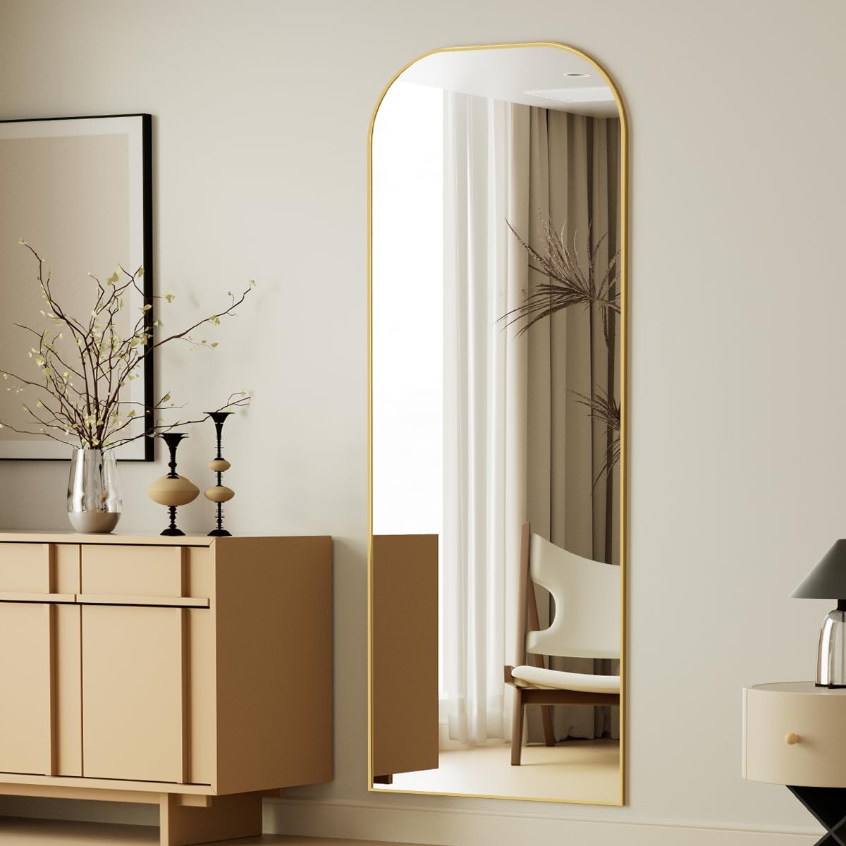Koonmi full-length mirror adds a stylish focal point to any room.