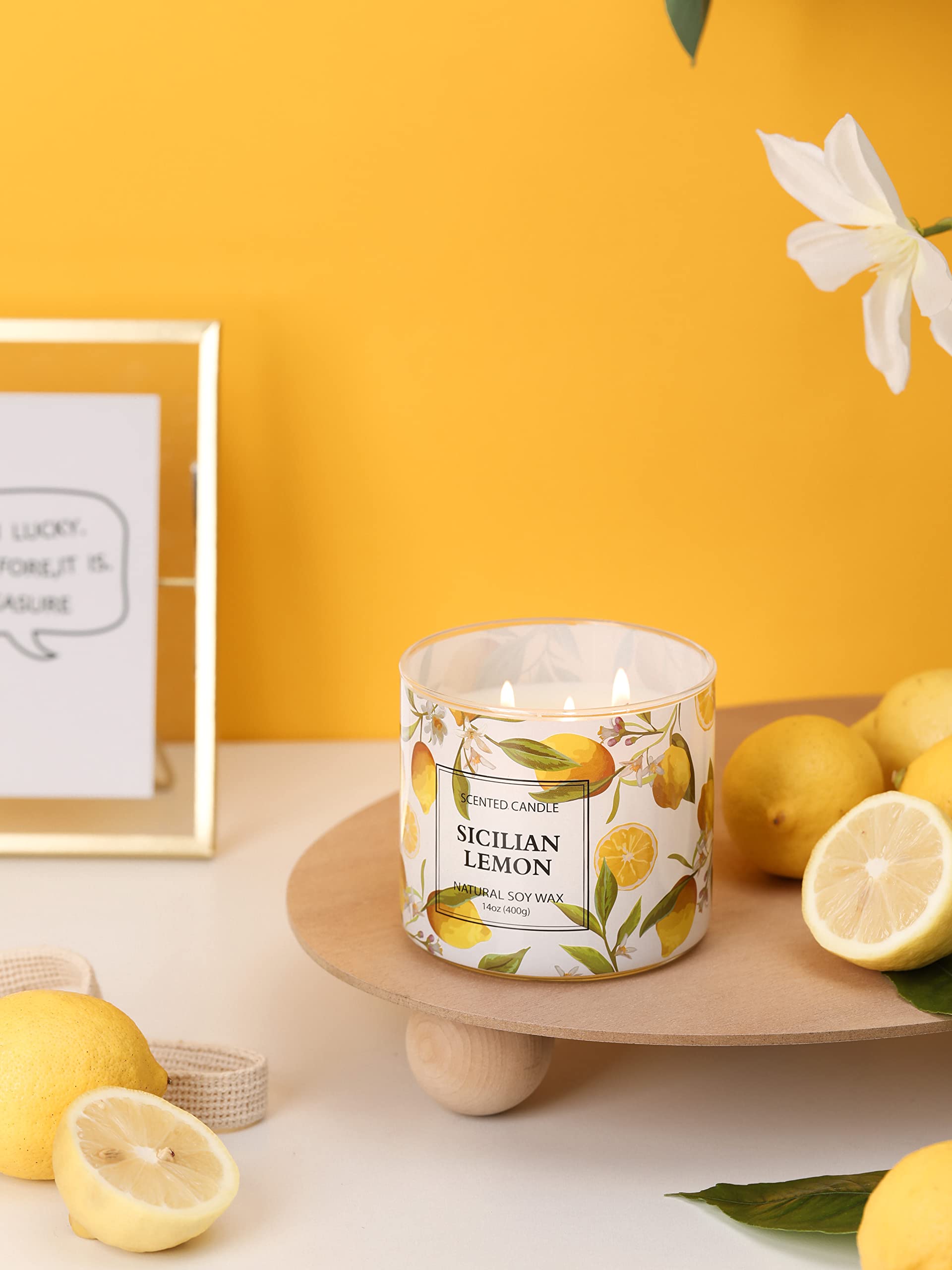 KORMMCO Lemon candle enhances a cozy living room ambiance during gatherings or quiet evenings.
