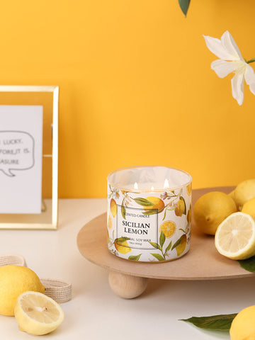 KORMMCO Lemon candle enhances a cozy living room ambiance during gatherings or quiet evenings.