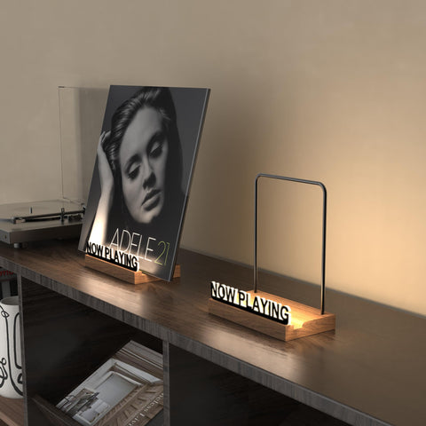 KORRTFID walnut-base vinyl display highlights albums with a warm, stylish centerpiece.