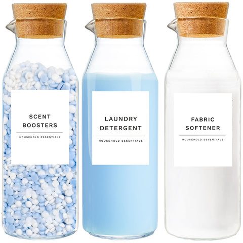 KOSKIMER glass laundry detergent dispenser set with cork lids for airtight freshness.