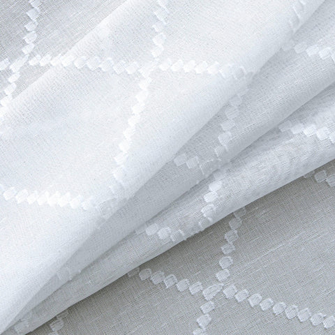 KOUFALL two-panel sheer curtain set with 8 grommets for easy mounting.
