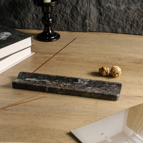 Koville marble incense holder features natural texture enhancing any room.