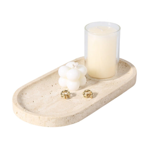 Koville travertine tray on bathroom counter highlighting natural pores and organization.