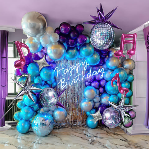 Kozee foil disco themed balloons add sparkling accents to the kit