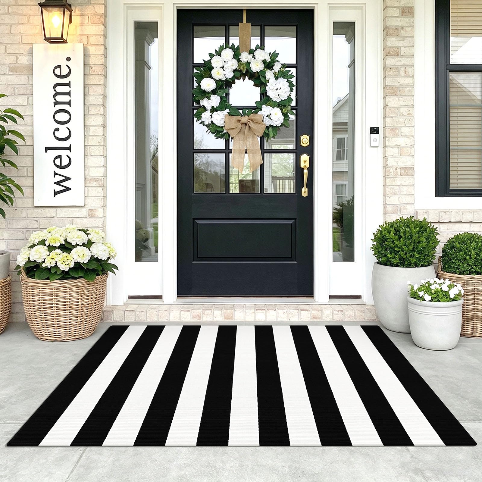 KOZYFLY black and white striped area rug enhances entryway curb appeal