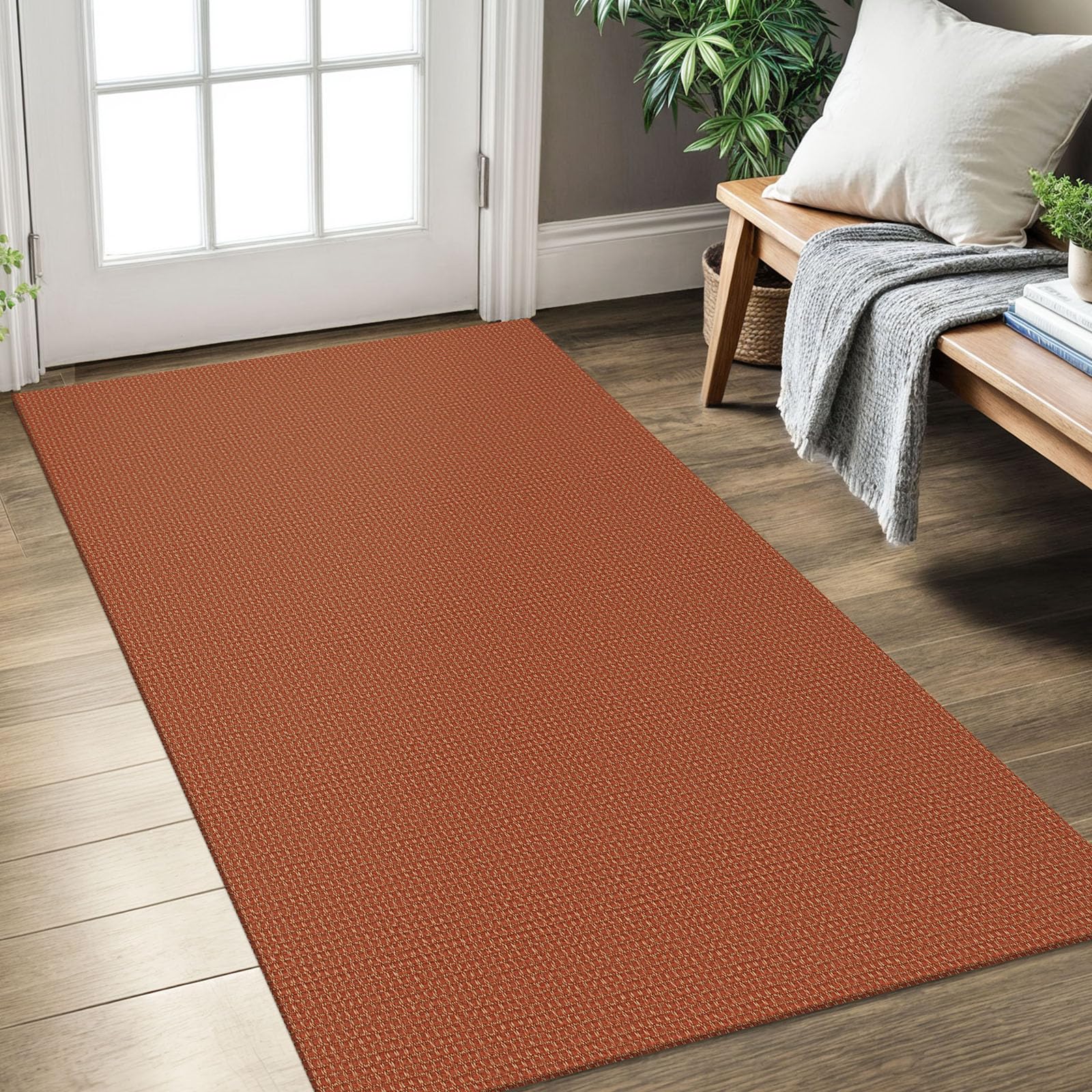 KOZYFLY entryway rug in orange-tan braided texture helps prevent slips