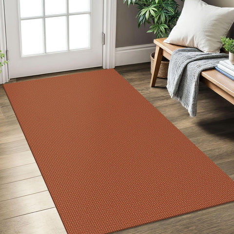 KOZYFLY entryway rug in orange-tan braided texture helps prevent slips