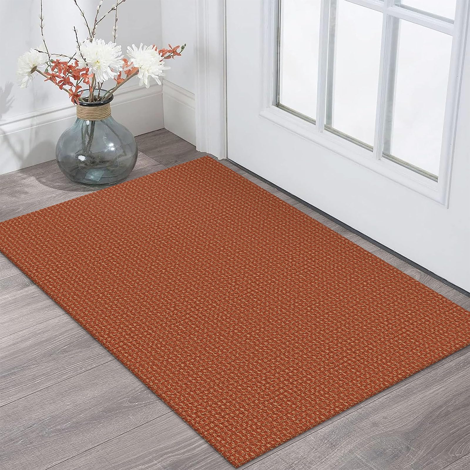 KOZYFLY indoor door mat with braided design for durable entryway use.