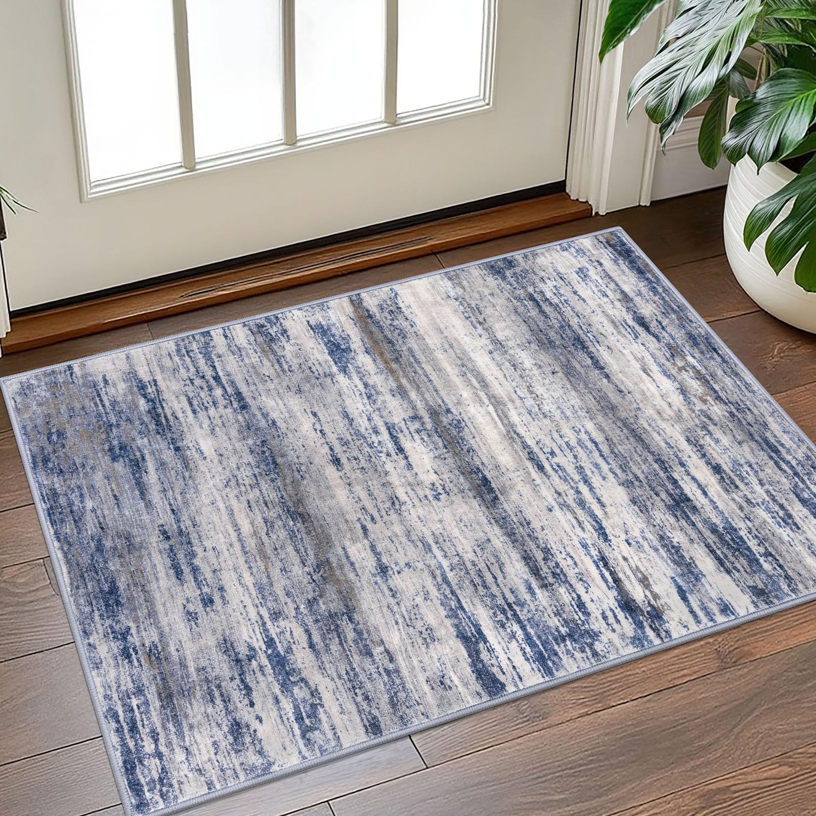 KOZYFLY low-pile rug offers smooth door clearance in entryways.