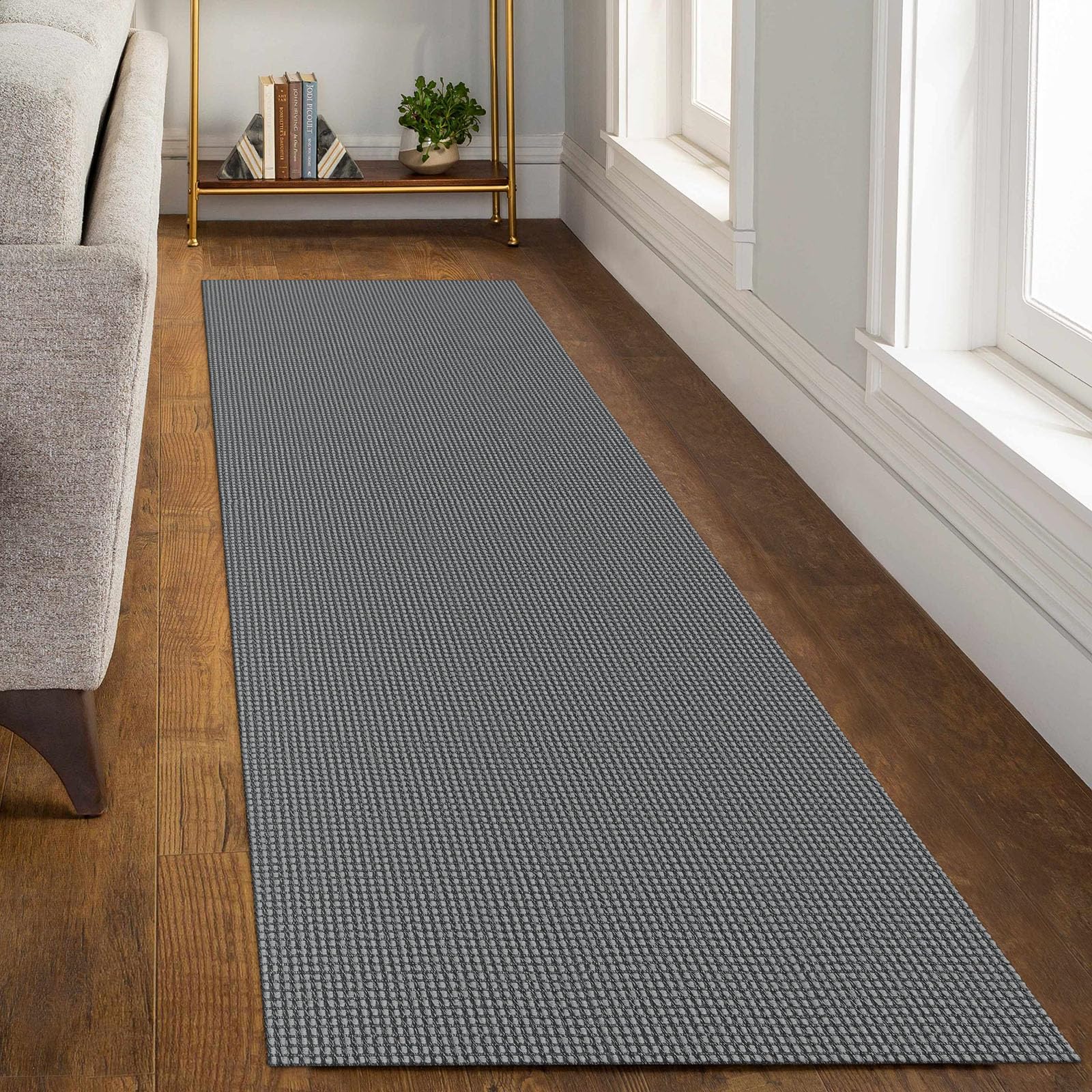 KOZYFLY in-use hallway setting shows long coverage and soft footfall