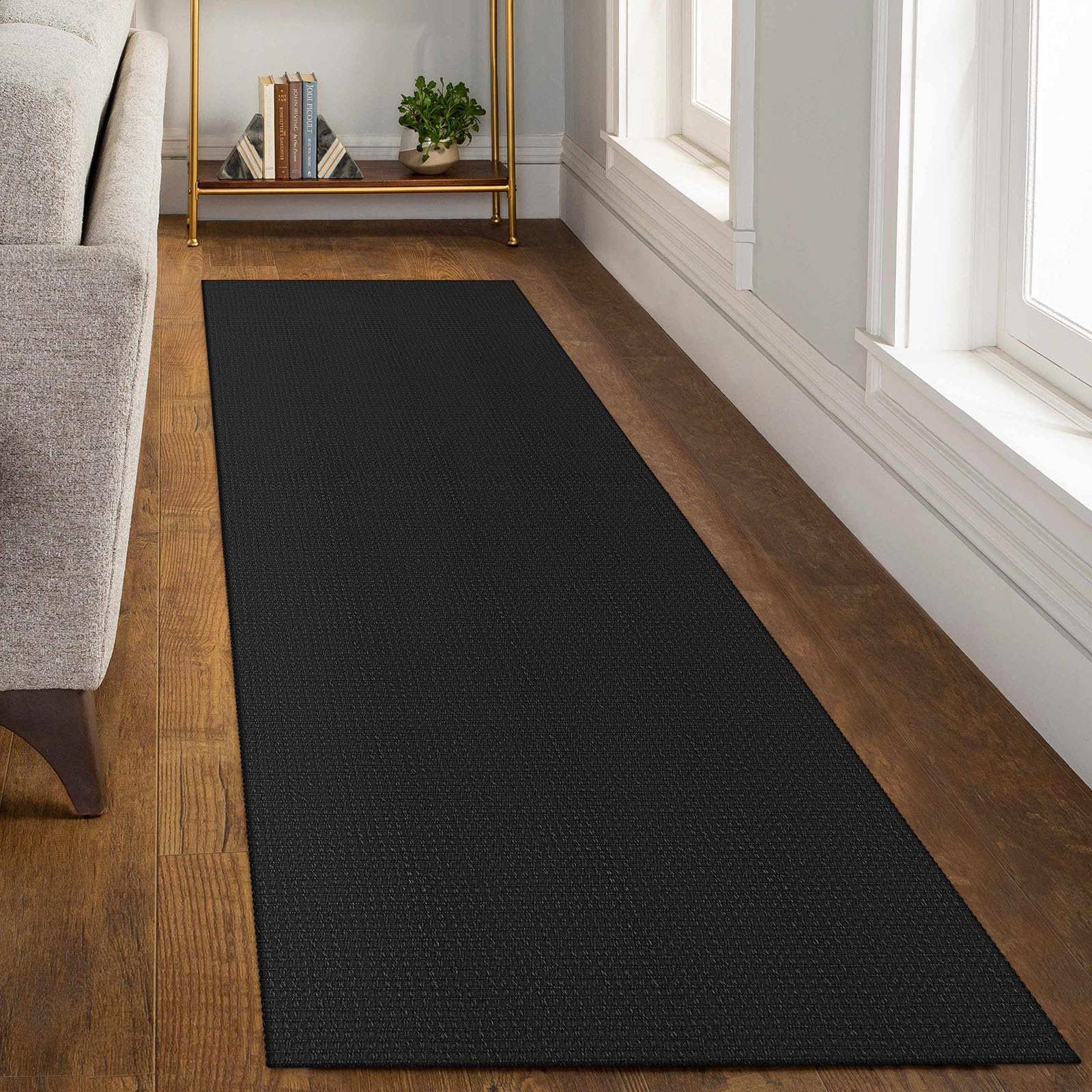 Kozyfly low-profile cotton rug preserves a clean silhouette.