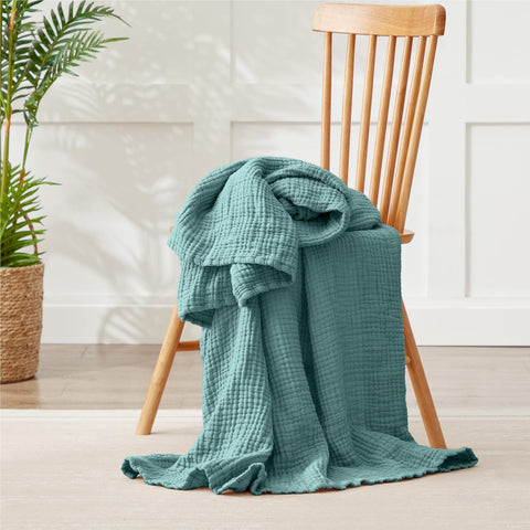 Kozyhvn six-layer muslin blanket offers breathable, cooling comfort.